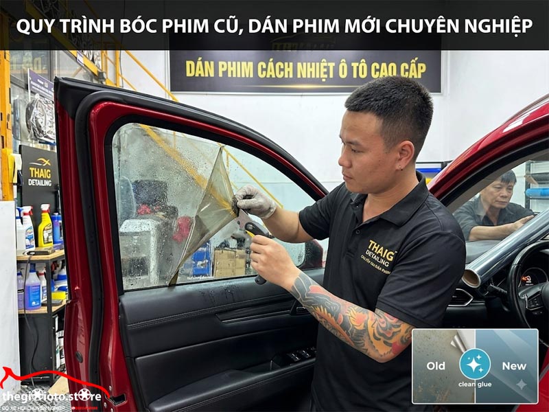nhan_vien_boc_mang_phim_cu_kinh_cua_xe_o_to_do